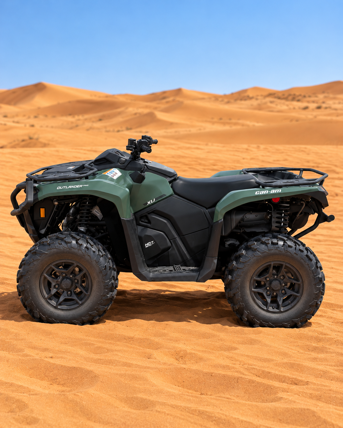 Profil du quad Can-Am Outlander PRO 570 posé sur le sable